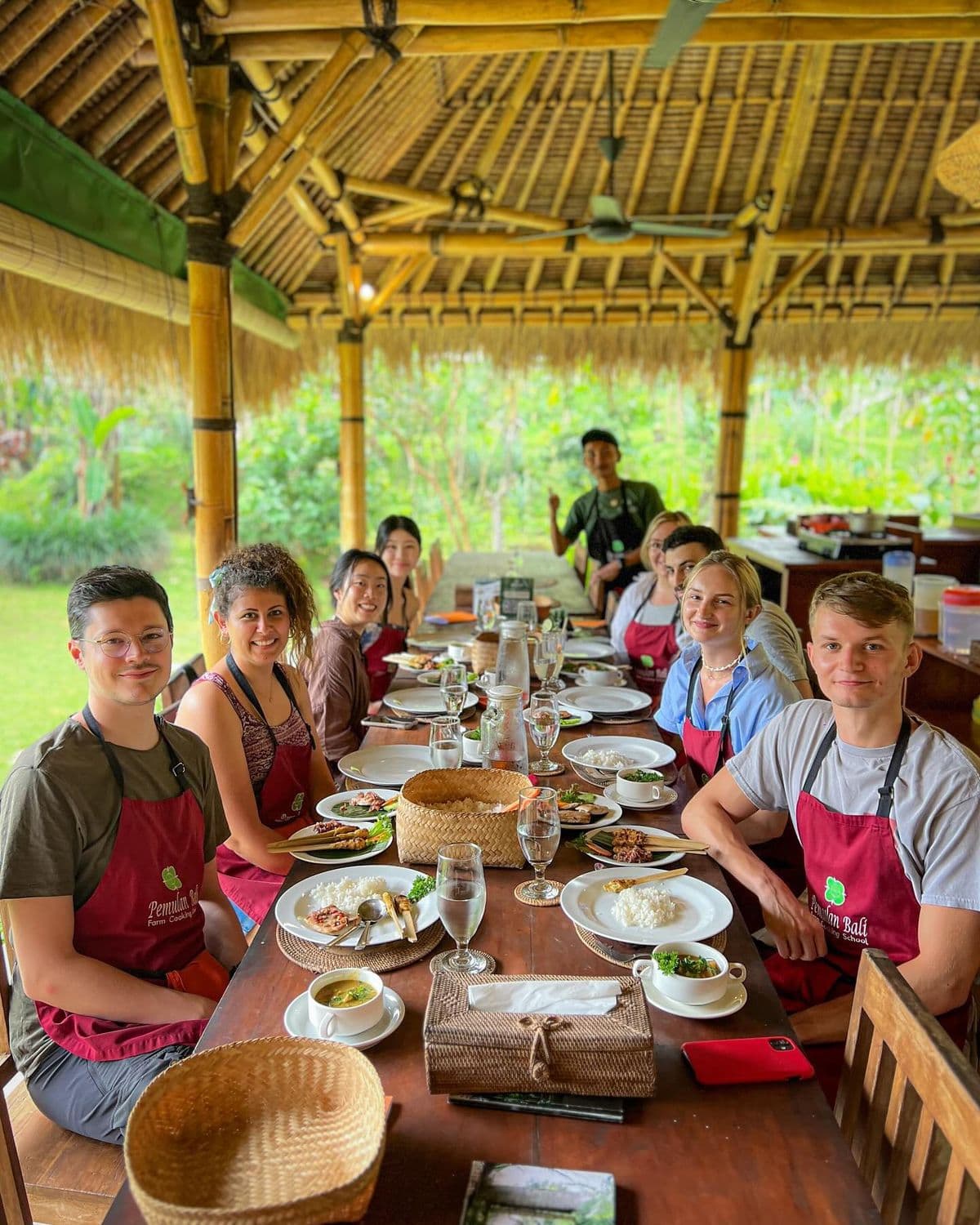 Bali Cooking Class Tour is a fun cultural experience where you learn to cook authentic Balinese dishes with local chefs using fresh ingredients, followed by enjoying the meals you prepare.