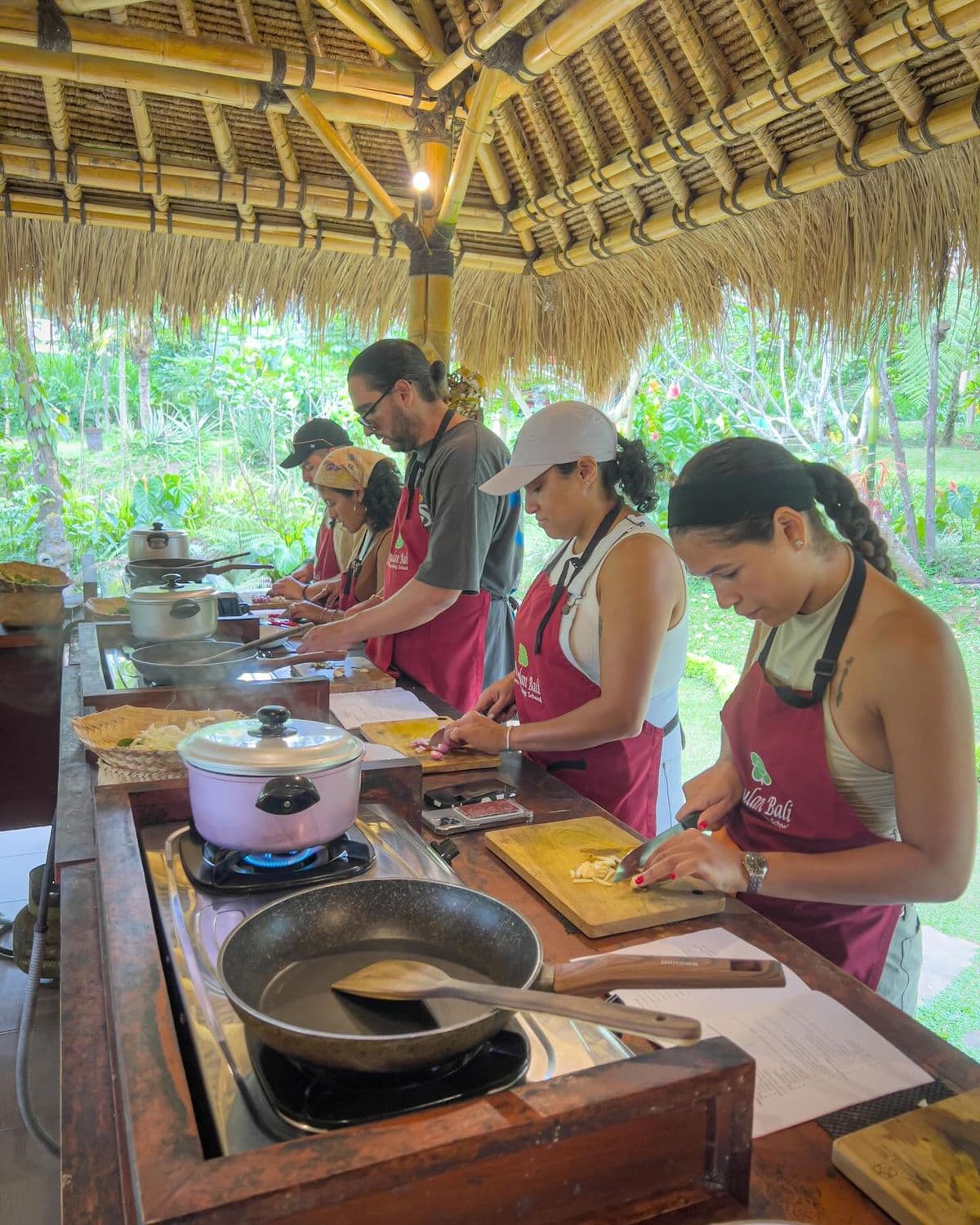 Bali Cooking Class Tour is a fun cultural experience where you learn to cook authentic Balinese dishes with local chefs using fresh ingredients, followed by enjoying the meals you prepare.