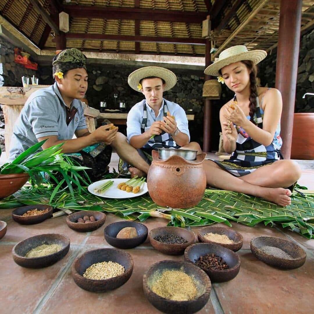 Bali Cooking Class Tour is a fun cultural experience where you learn to cook authentic Balinese dishes with local chefs using fresh ingredients, followed by enjoying the meals you prepare.
