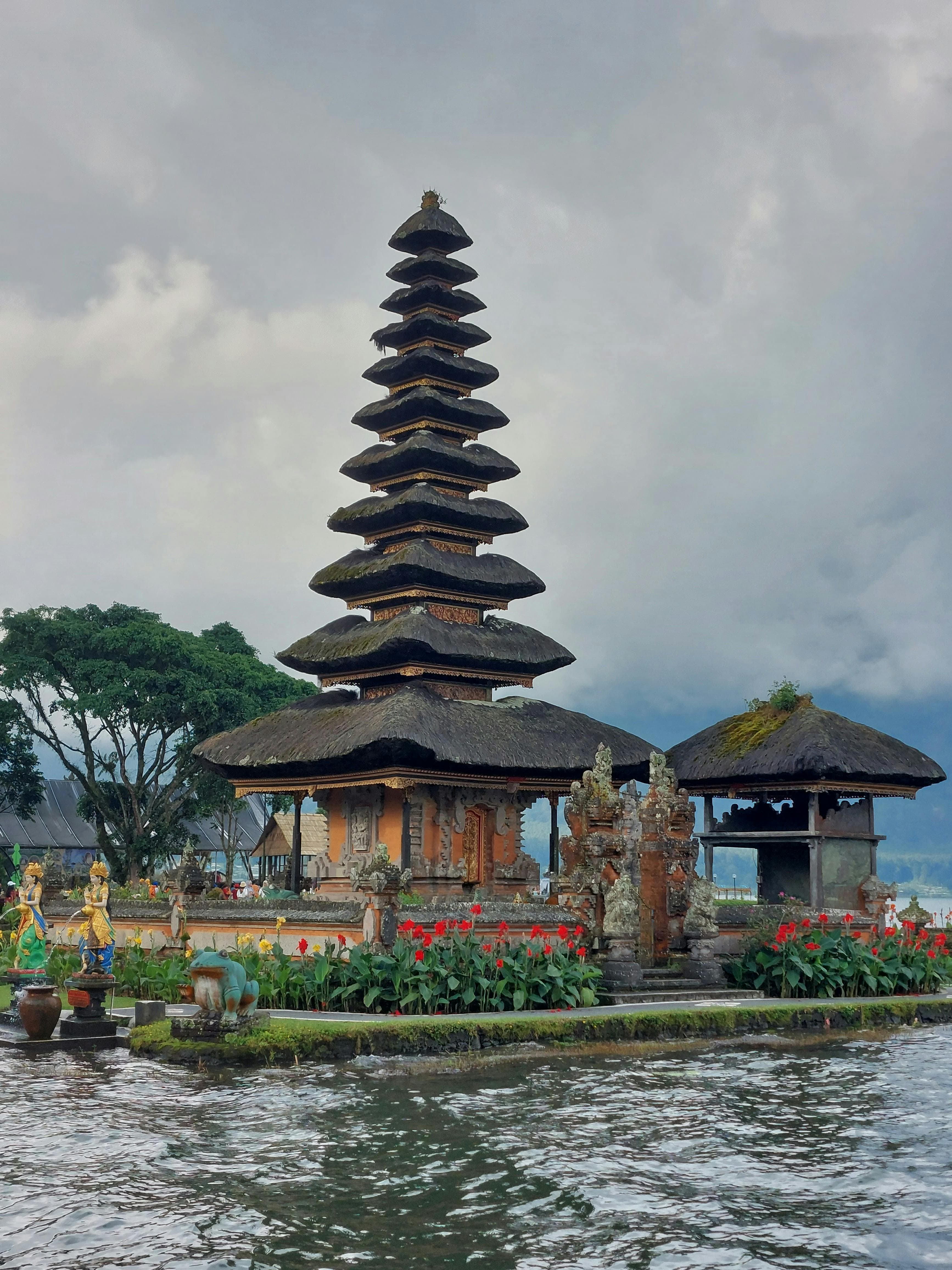 Located on the shores of Lake Beratan in Bedugul highlands, this beautiful floating temple is dedicated to the goddess of water