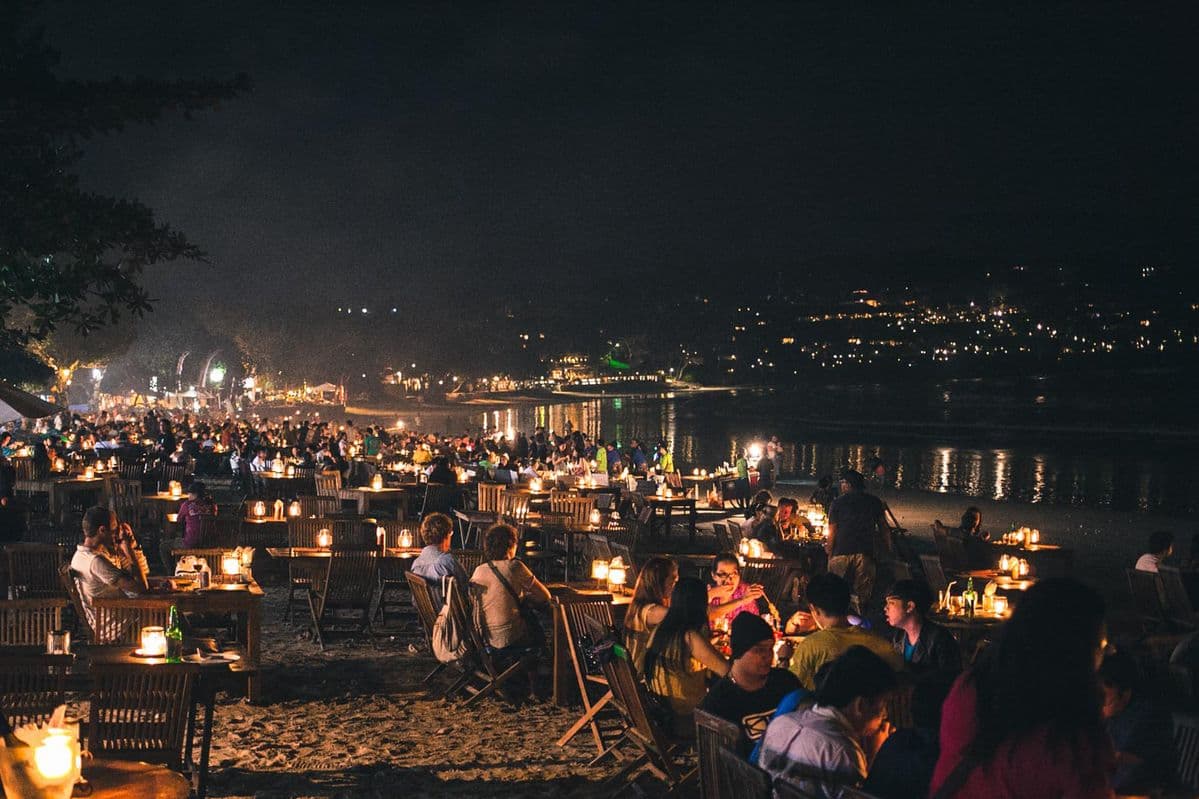 End your perfect day with a romantic candlelight seafood dinner on the beach