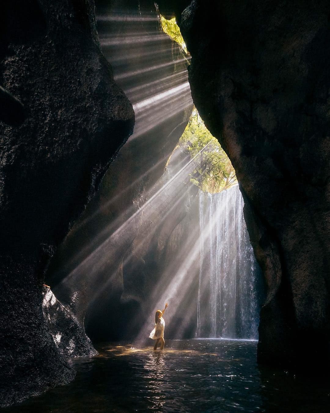 Tukad Cepung Waterfall – Hidden waterfall inside a cave with dramatic light rays