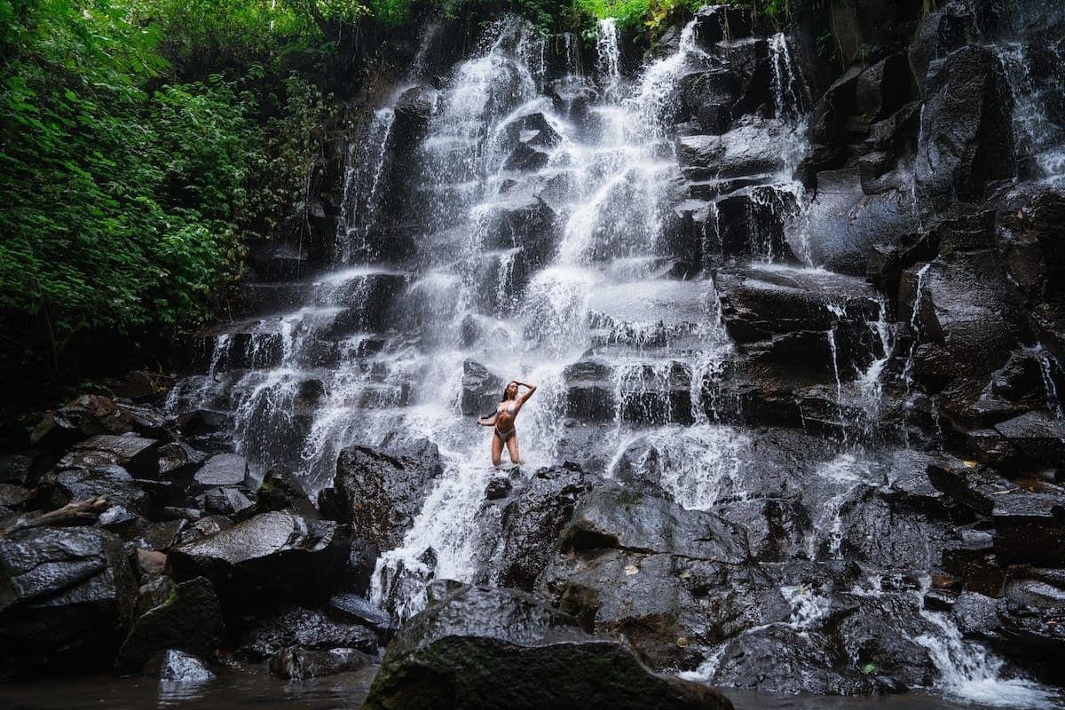 Discover a stunning multi-level waterfall with natural rock formations, ideal for taking Instagram-worthy photos. Discover a stunning multi-level waterfall with natural rock formations, ideal for taking Instagram-worthy photos.