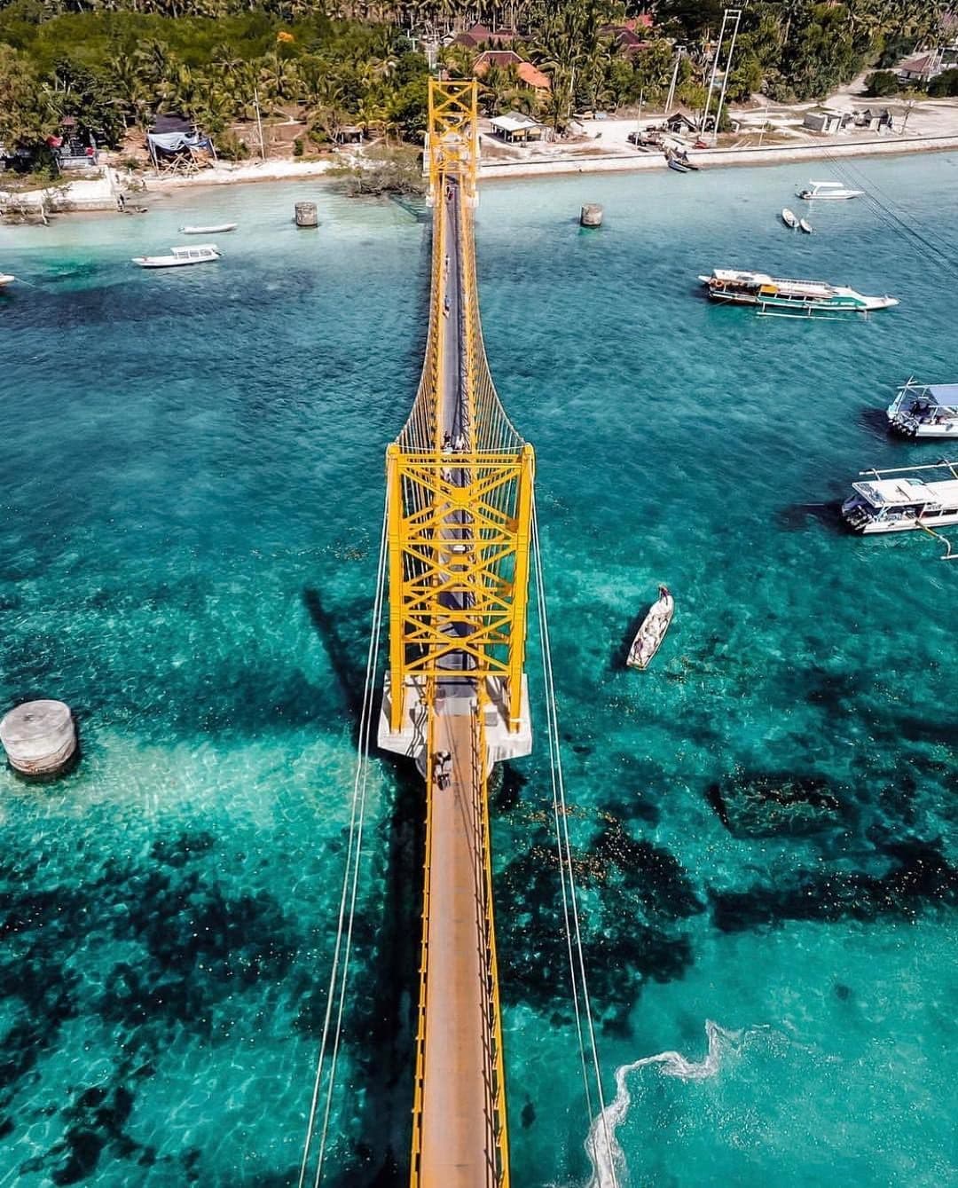 The bright yellow pedestrian bridge connecting Nusa Lembongan to Nusa Ceningan — great for photos The bright yellow pedestrian bridge connecting Nusa Lembongan to Nusa Ceningan — great for photos